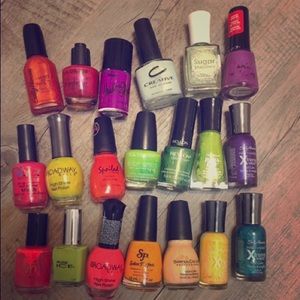 Various colors/ brands nail polish.